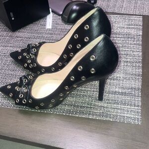 kate spade Black Pointed-Toe Pumps with Gold Grommet Detail